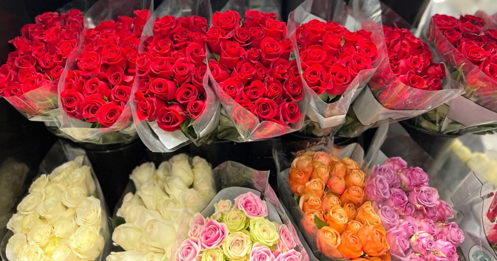 bunches of Costco roses on display in cellophane in warehouse