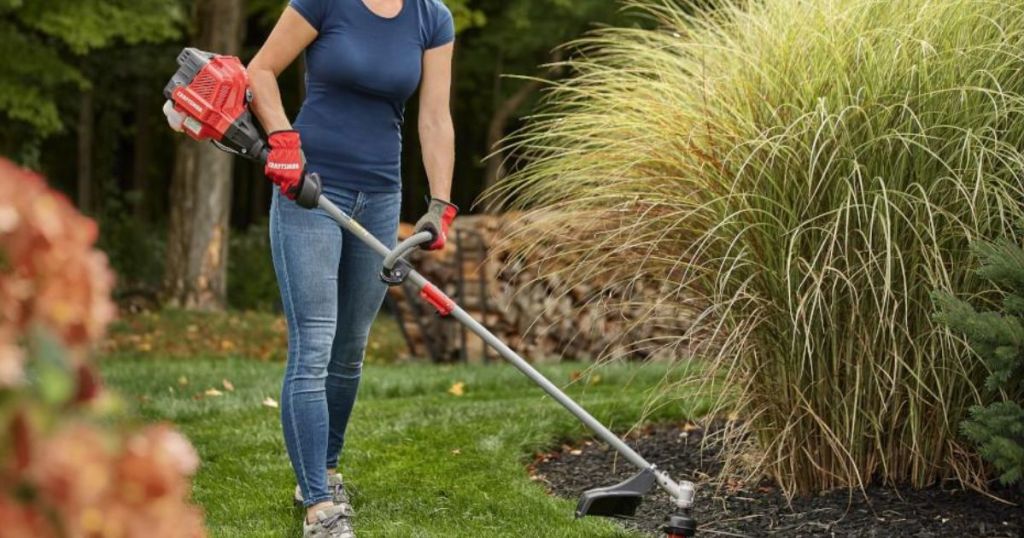 woman using Craftsman trimmer