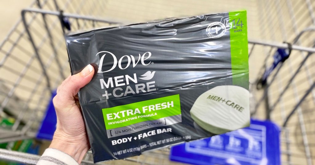 hand holding pack of dove men + care bar soap