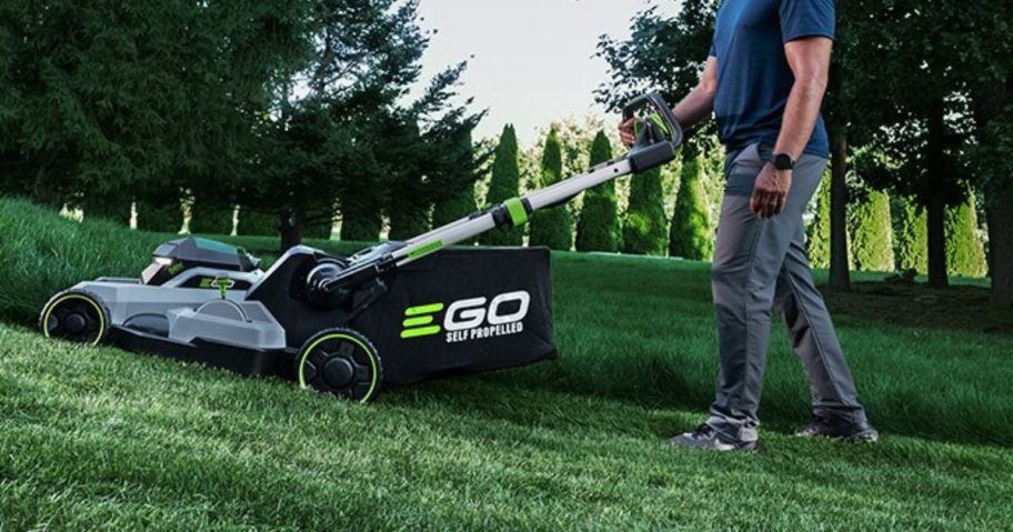 man mowing lawn with EGO mower