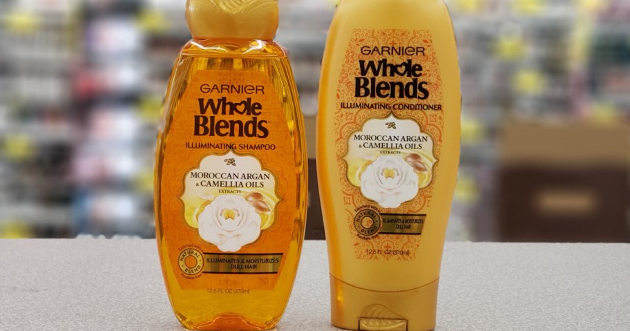 bottle of Garnier brand shampoo & conditioner on store counter