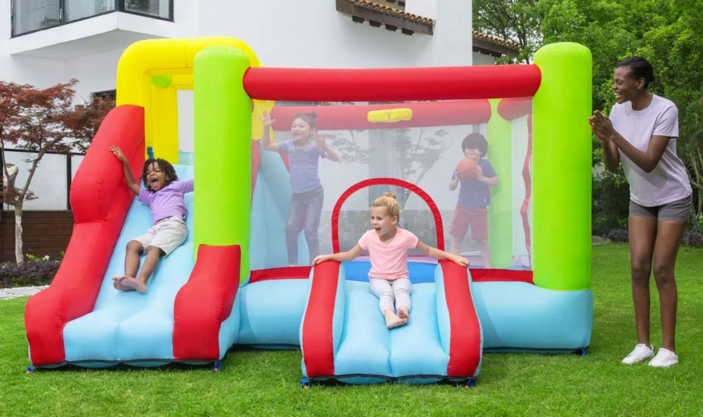 kids playing on bounce house