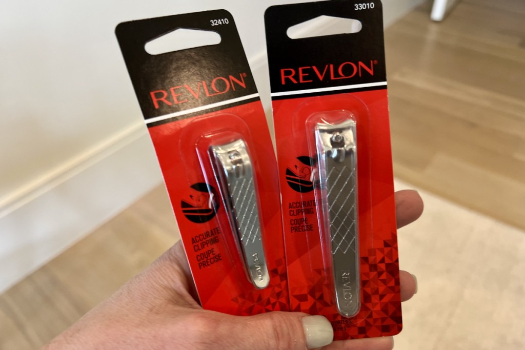 Hand holding Revlon clippers