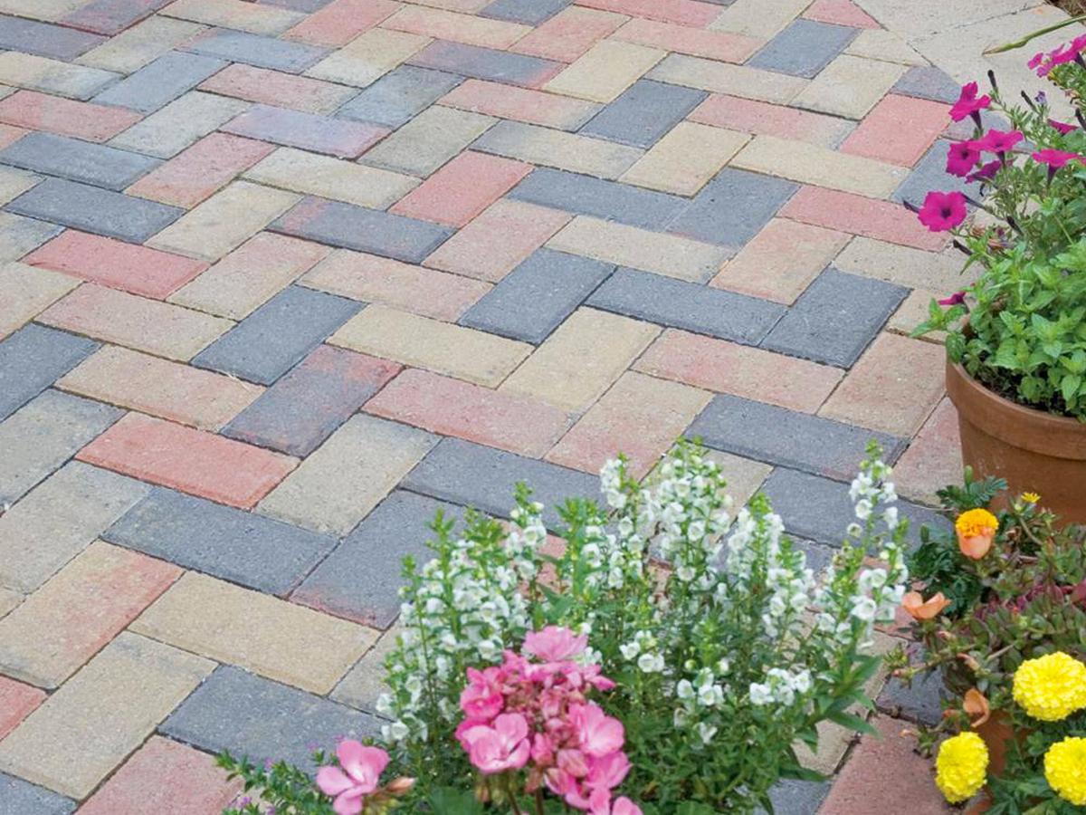 colorful concrete brick pavers laid together making a patio