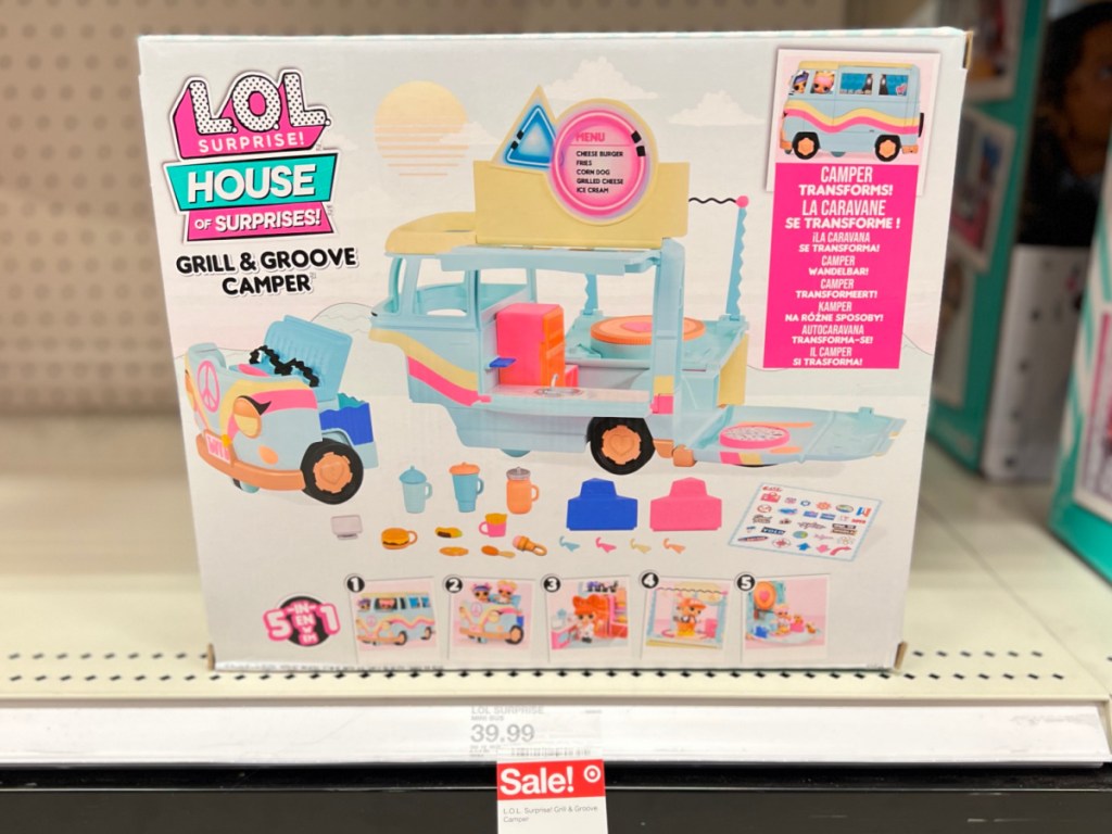 kids grill and camper playset on store shelf