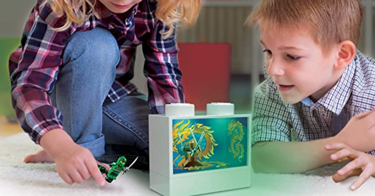 children looking at Lego light up display box