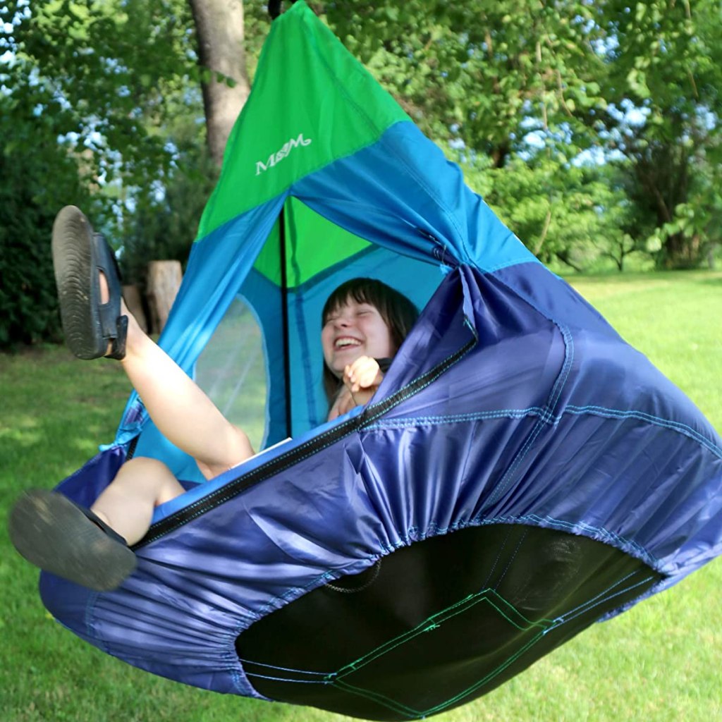 girl on a tent swing