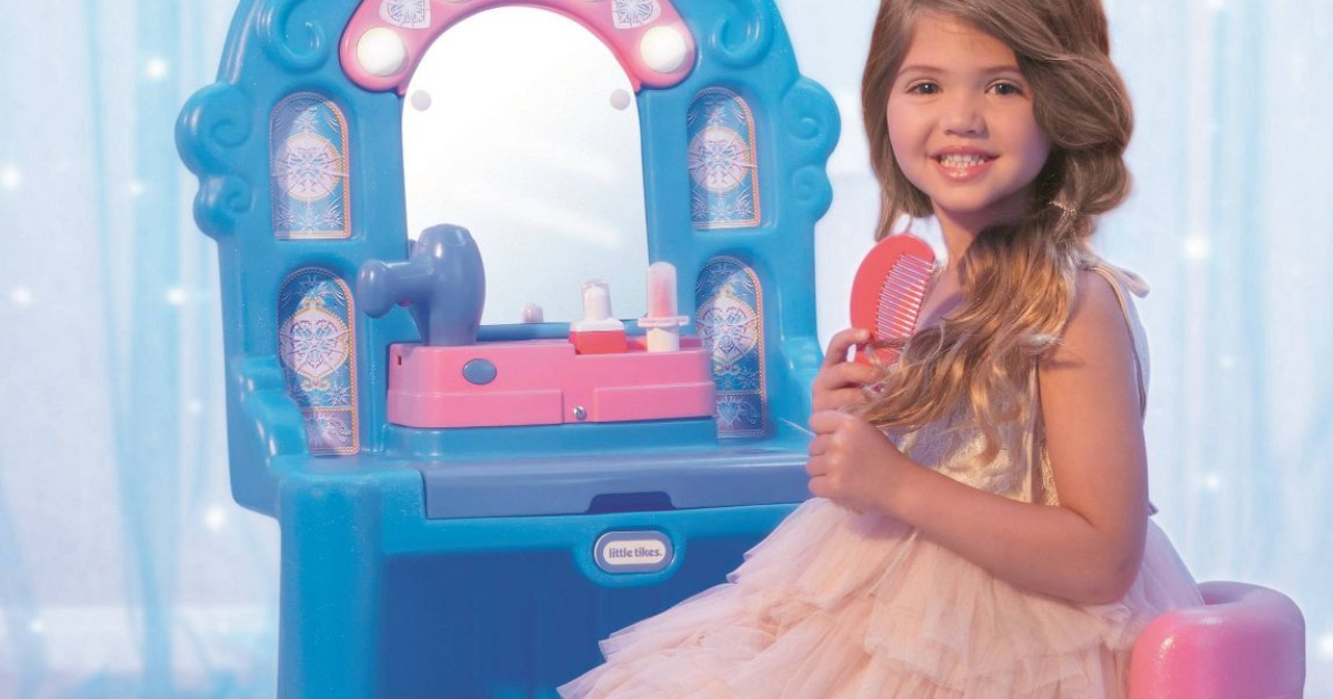Little Girl combing her in front of Little Tikes Ice Princess Magic Mirror Vanity with Lights & Sounds 