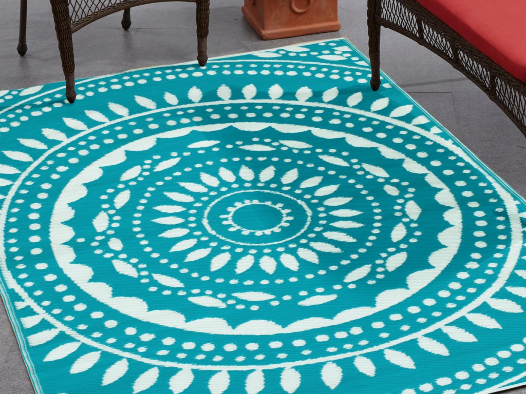 teal medallion rug on patio