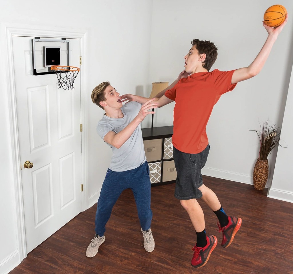 kids playing indoor basketball