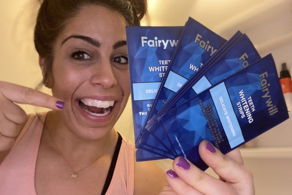Lady trying Teeth Whitening Strips