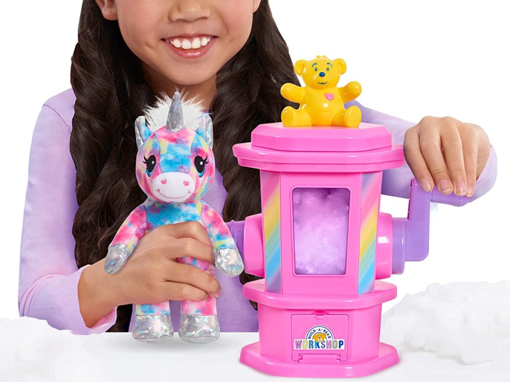 Little girl with Build A Bear Stuffing Station