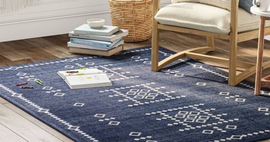 Navy area rug with patterns