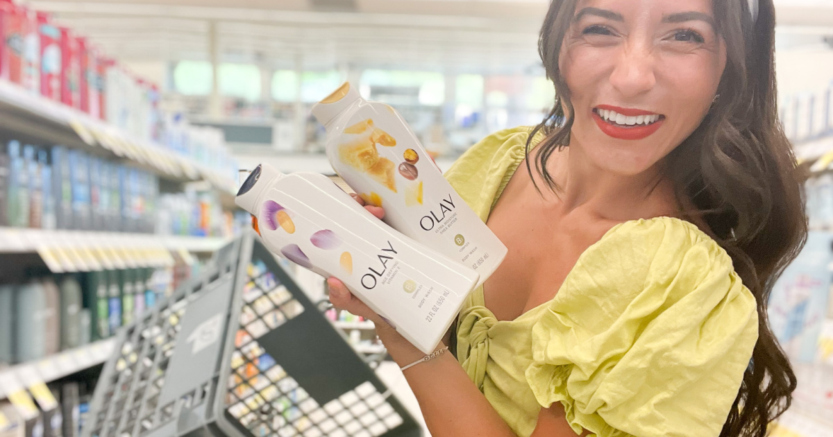 woman holding olay body products and shopping basket