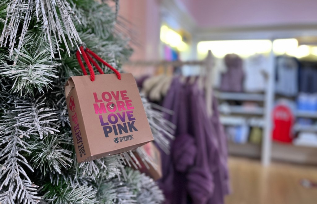 PINK bag handing on christmas tree for PINK holiday sale