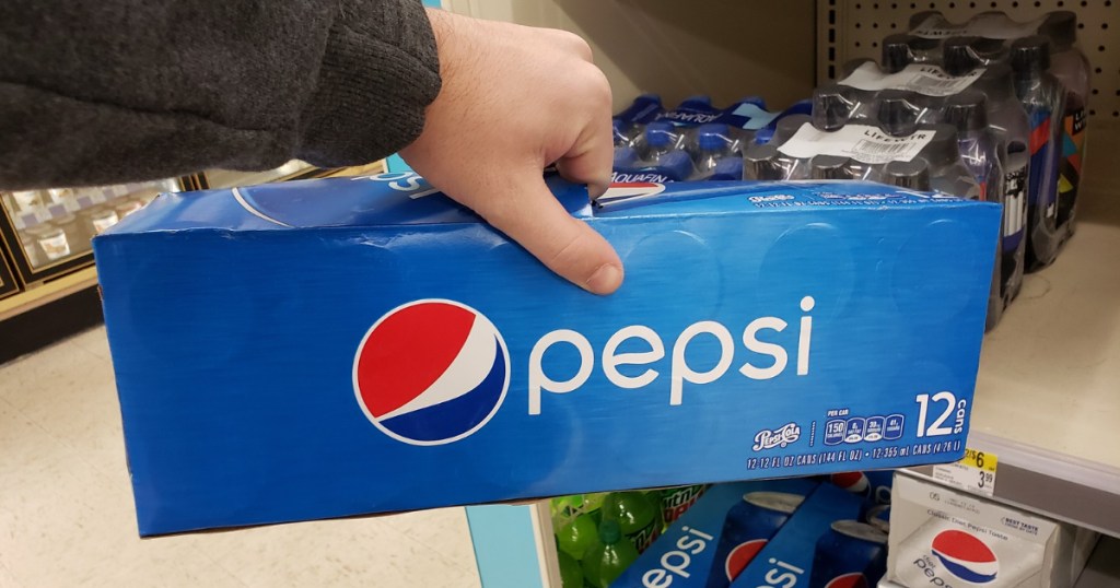 Hand holding Pepsi 12-pack