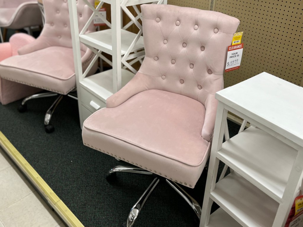 rolling pink desk chair in store