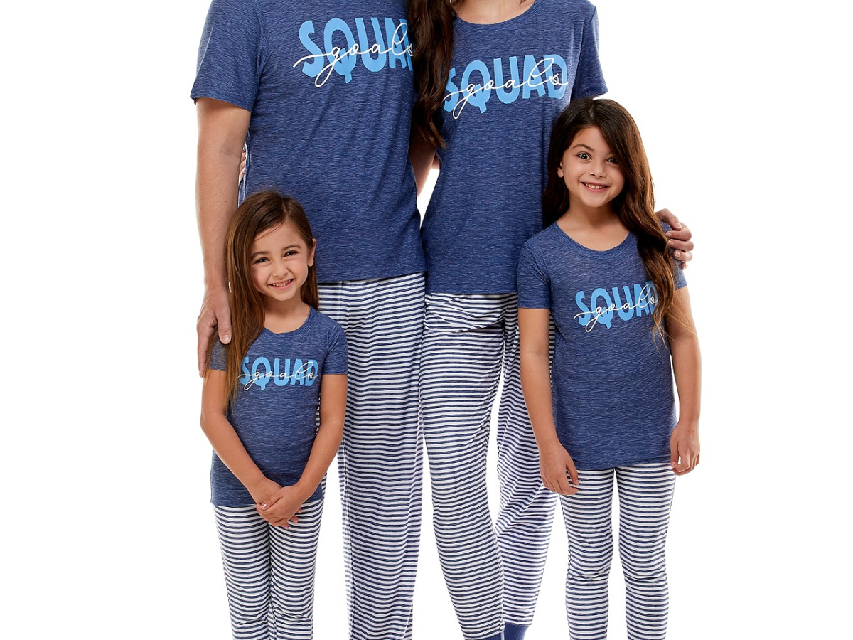 family wearing matching pajamas