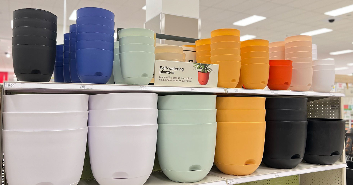 different colors of self watering planters on store shelf