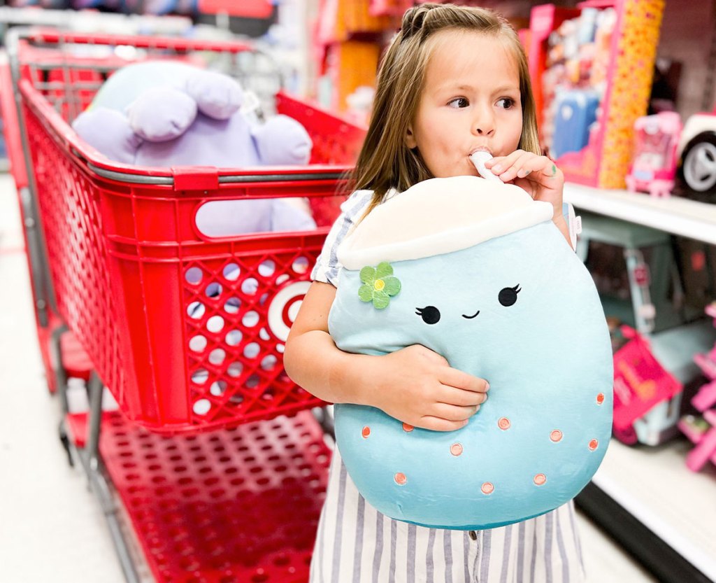 girl holding boba drink squishmallow