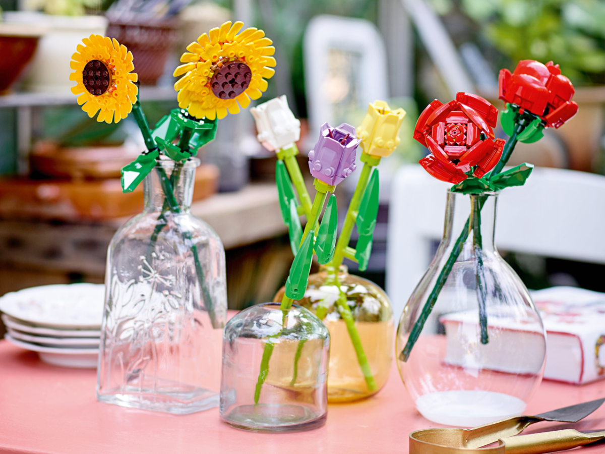 LEGO Sunflower, tulips and roses in glass vases on table