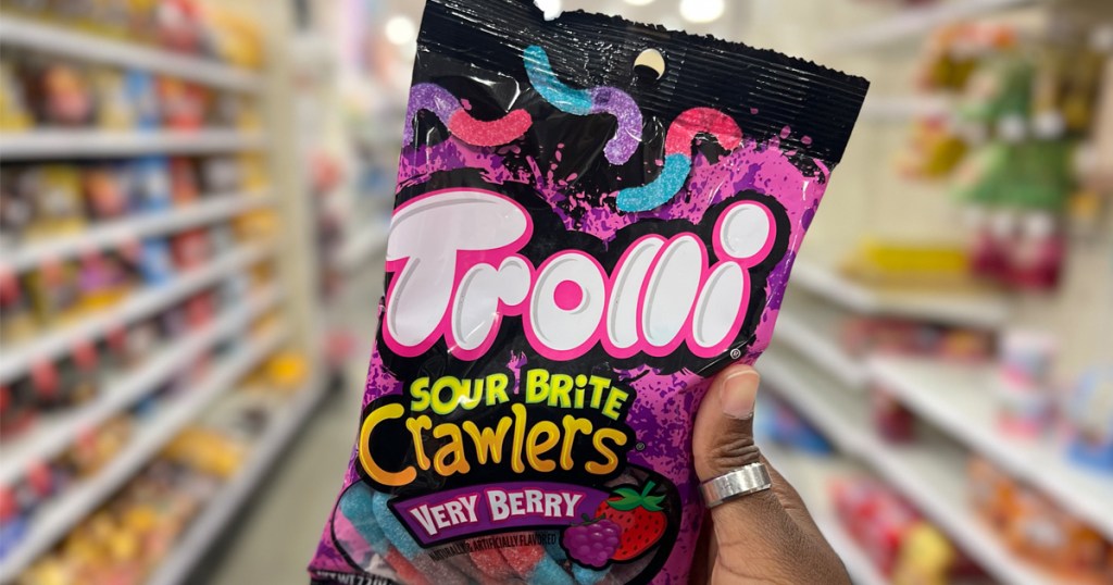 Trolli Sour Brite Crawlers Very Berry Bag being held in a store