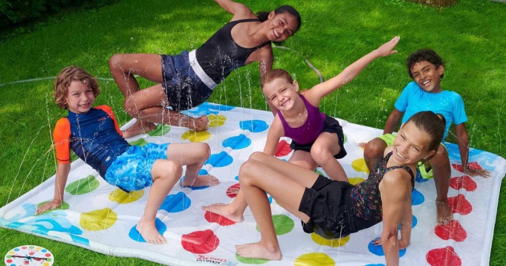 Kids playing water Twister outside