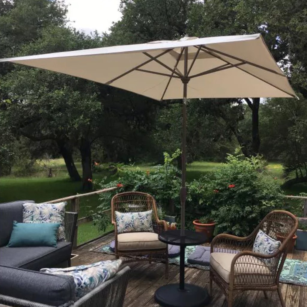 Umbrella over patio furniture