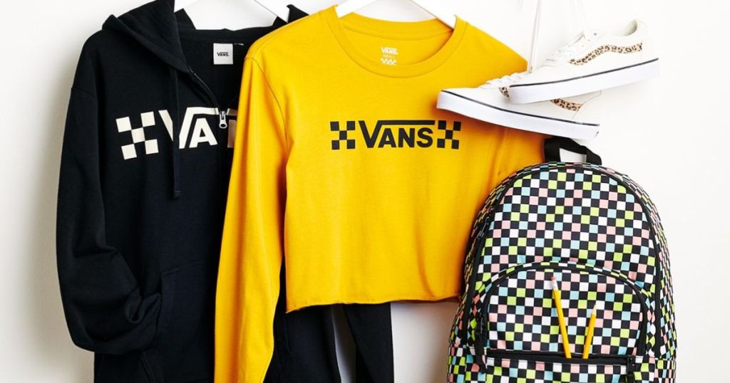 Vans clothing on hangers