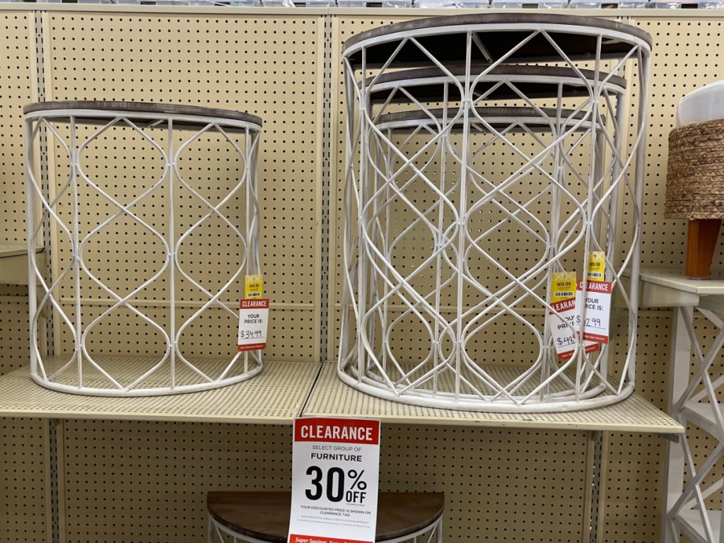 white side tables on store shelf