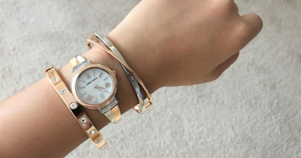 anne klein watch and bangles set on woman's wrist