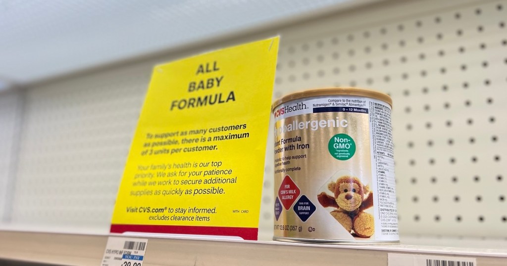 purchase limit sign next to can of baby formula