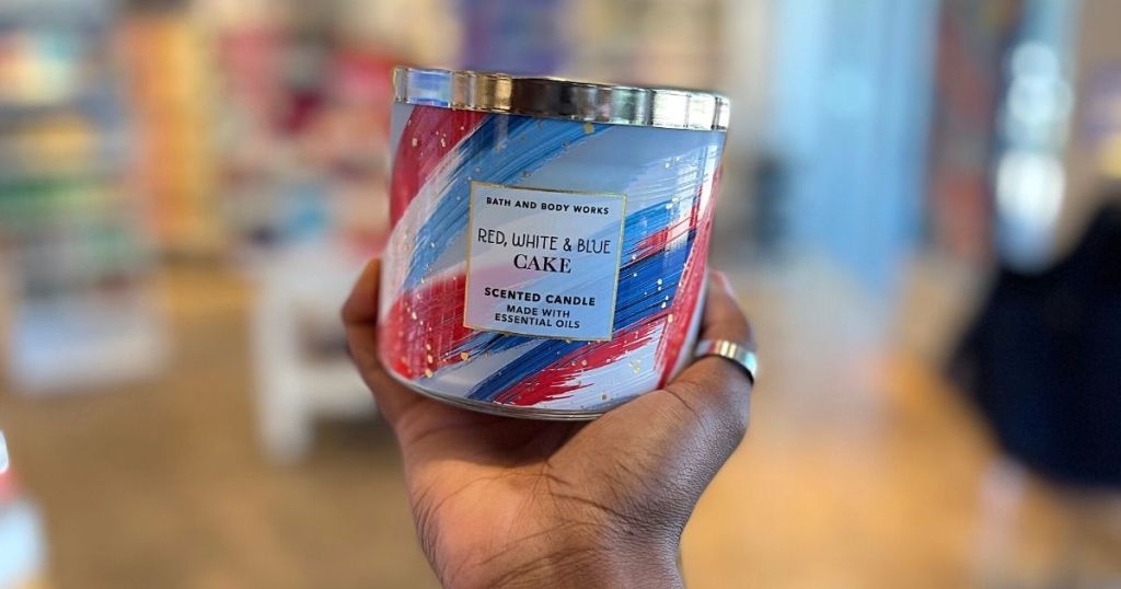 handholding Red white and Blue Cake candle
