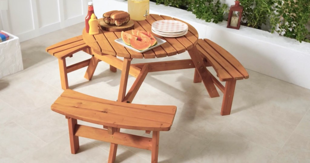 circular wooden picnic table with benches