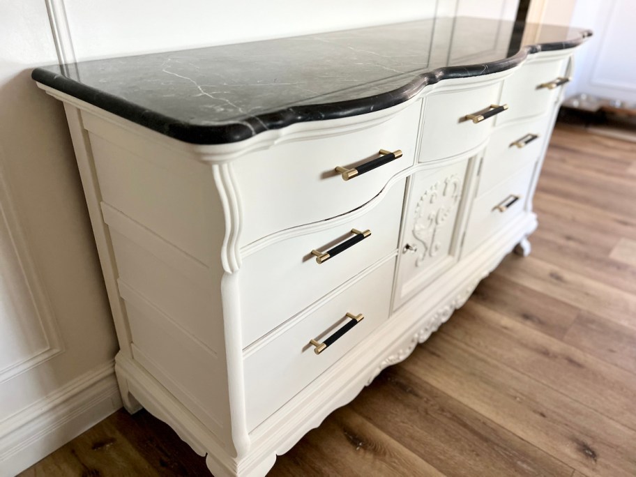 white chalk paint furniture dresser with black marble slab