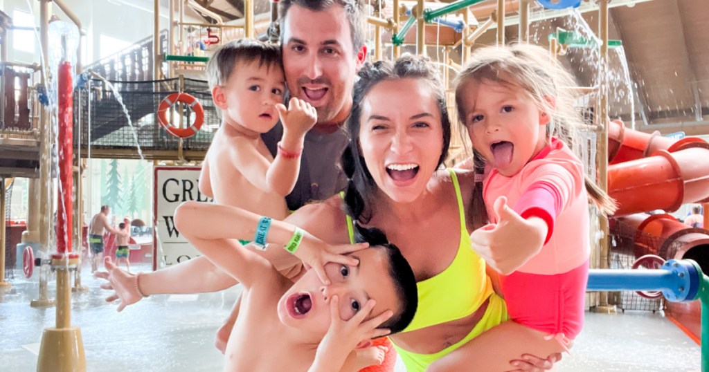 family standing in Great Wolf waterpark