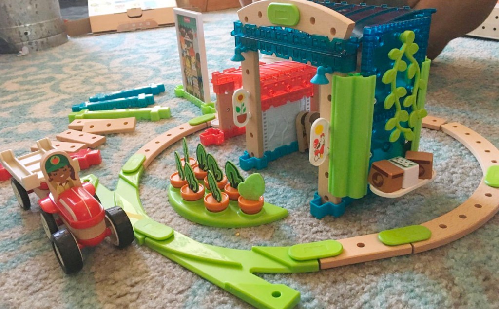 fisher price train set on floor