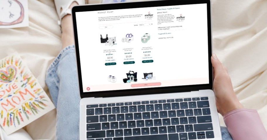 woman holding laptop with free breast pumps on screen