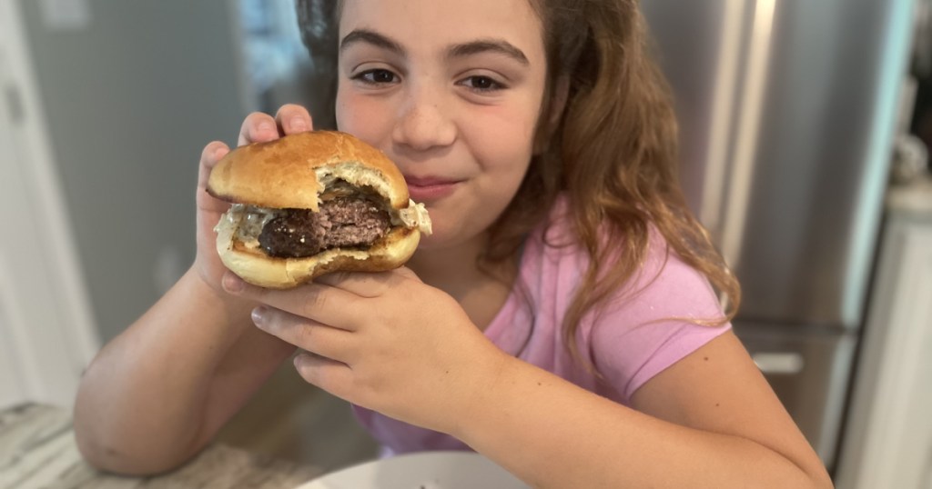 girl eating burger