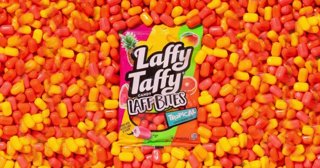 bag of Tropical Laff Bites surrounded by candy 