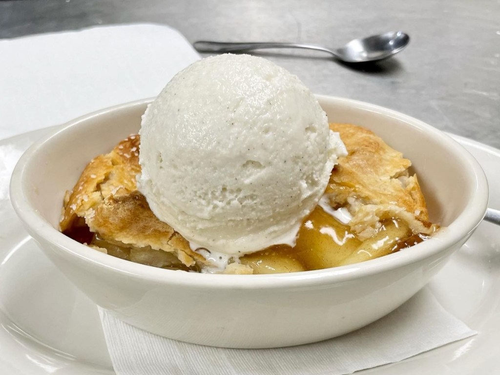 cobbler with ice cream in a white bowl