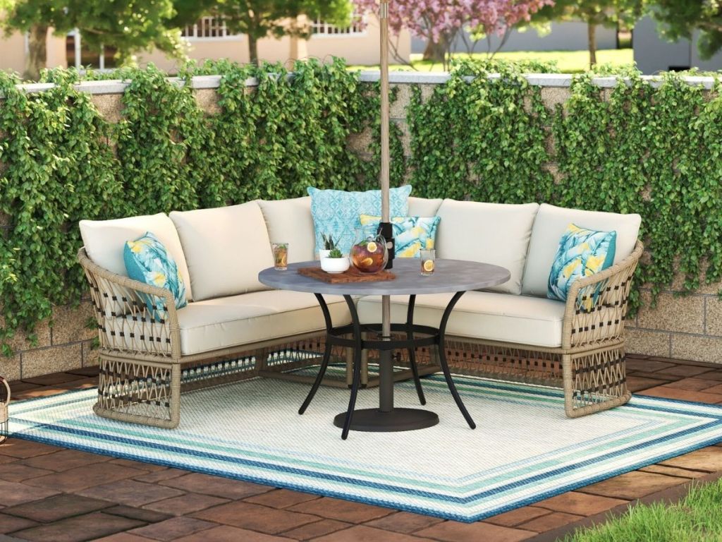 wicker outdoor sectional with off white cushions