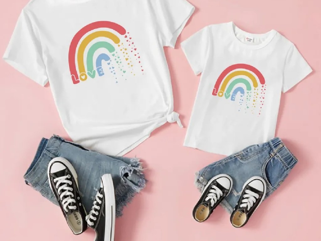 womens and girls outfits with rainbow shirt, jean shorts and black and white sneakers