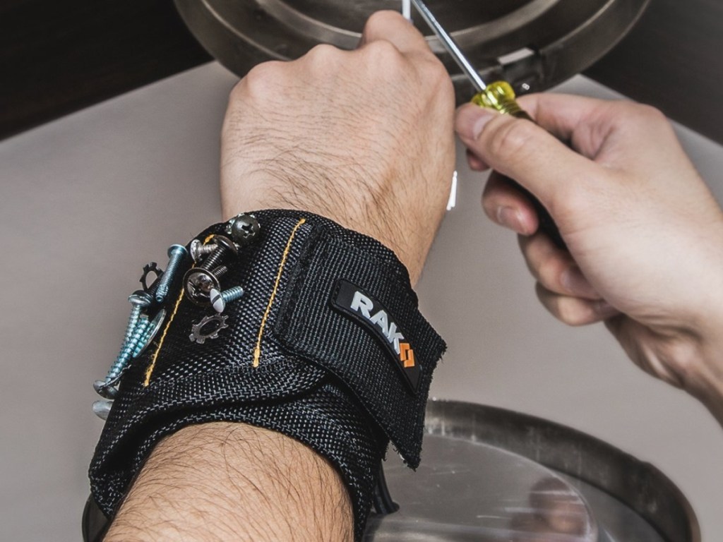using a screwdriver while wearing a magnetic wristband