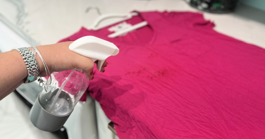 spraying shirt with wrinkle release