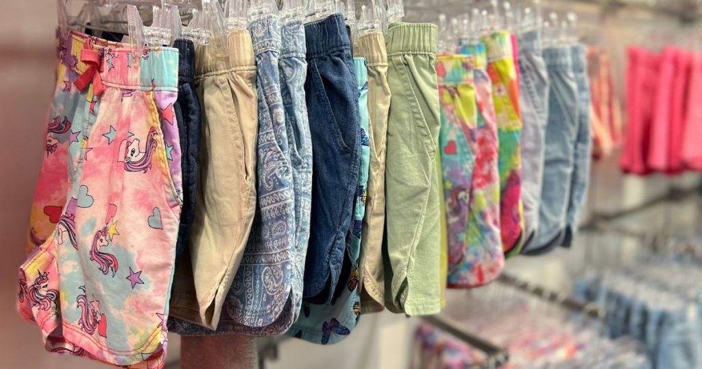 the childrens place girls shorts hanging in store