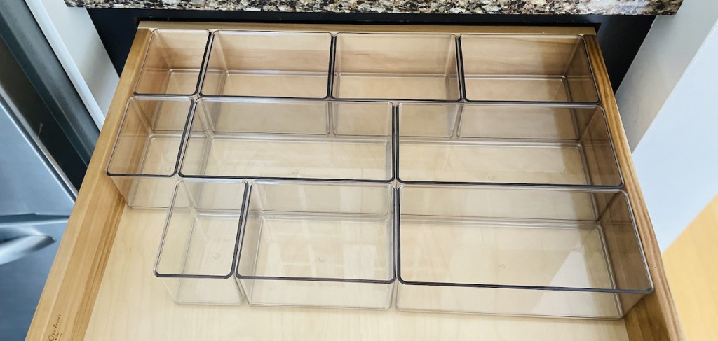 clear empty organizing containers in drawer 