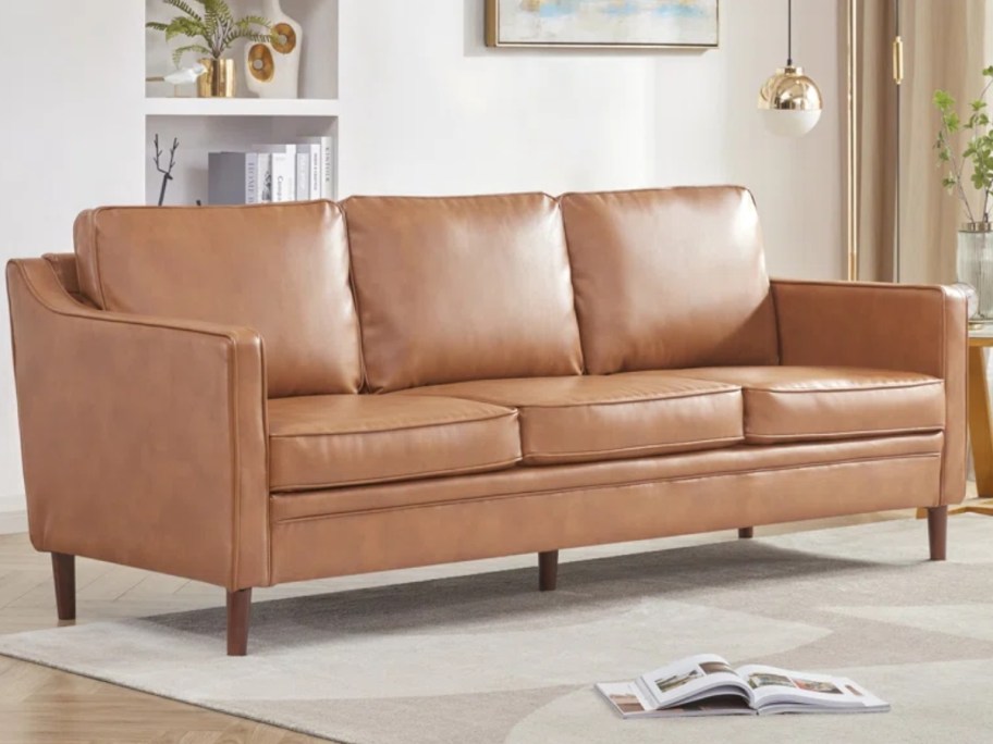 brown faux leather sofa in a living room