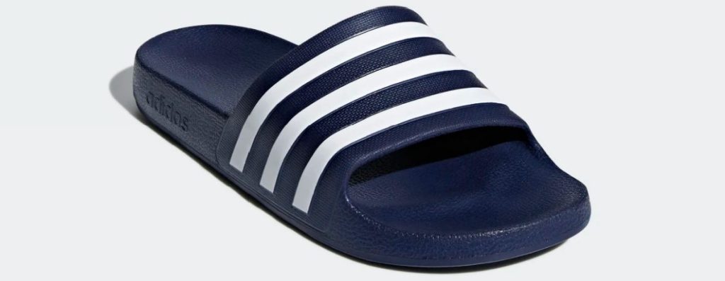 dark blue slide sandal with white stripes