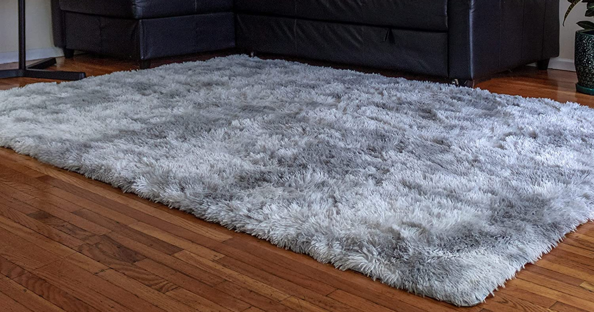 Area rug on wood surface
